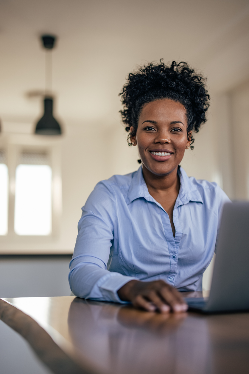 Portrait of happy adult woman, promoting her new business